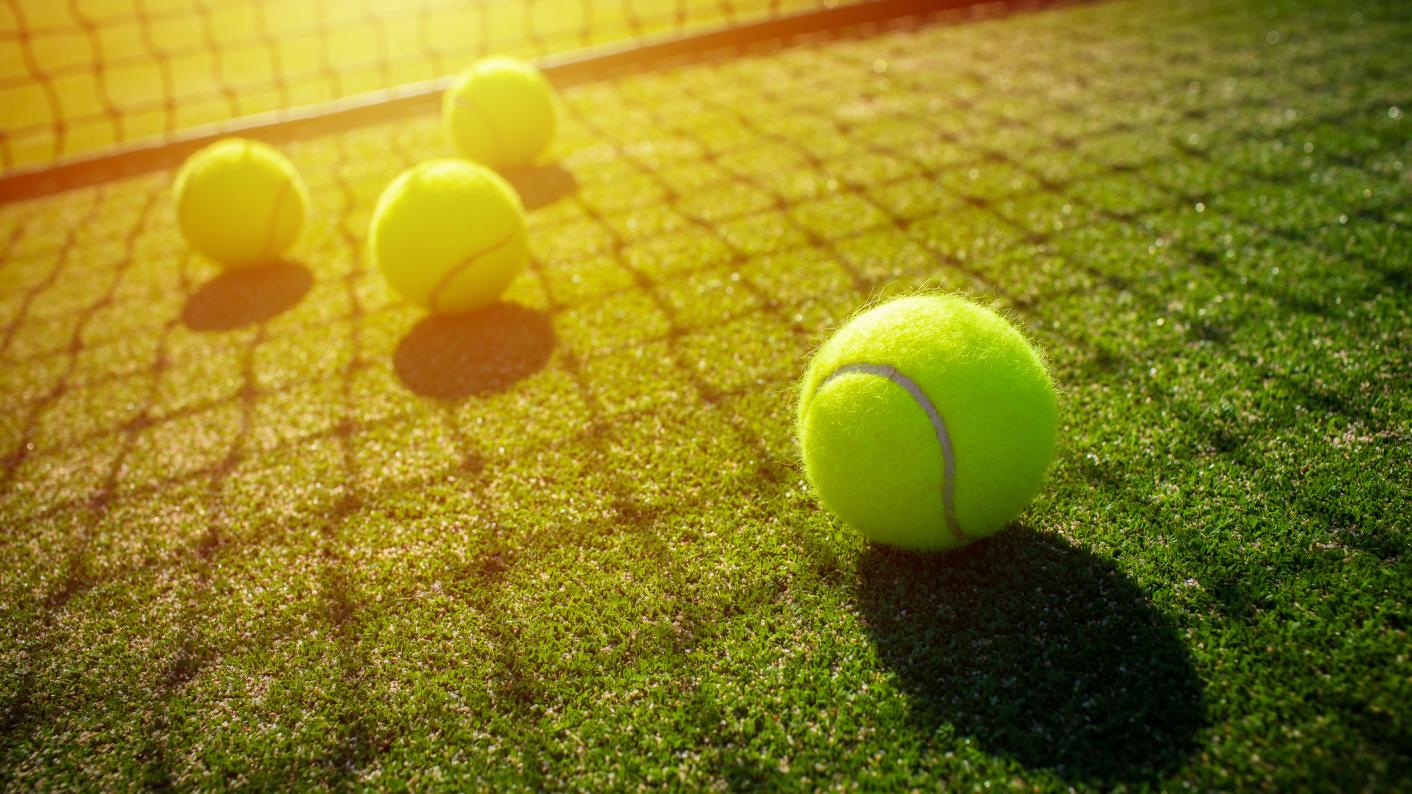 Tennis balls and net showing Wimbledon and tennis-themed resources for primary and secondary